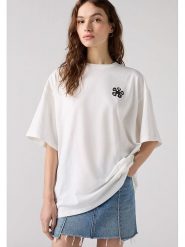 Levi's Koszulka w kolorze białym ze wzorem rozmiar: L. Białe koszulki damskie Levi's, l, bez wzorów, z bawełny, bez kołnierzyka, bez ramiączek. Za 91.34 zł.