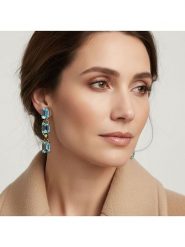 Otazu Pozłacane kolczyki-wkrętki z kryształami Swarovski rozmiar: onesize. Niebieskie kolczyki damskie Otazu, z kryształem, pozłacane. Za 304.99 zł.