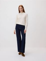 Jeansy flare z przeszyciem - granatowy. Niebieskie jeansy damskie Reserved. Za 159.99 zł.