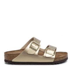 Klapki Birkenstock. Żółte klapki damskie Birkenstock, bez wzorów, bez obcasa, bez zapięcia. Za 319.99 zł.