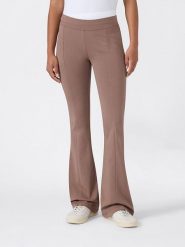 Champion Legginsy w kolorze beżowym rozmiar: XS. Brązowe legginsy damskie Champion, xs, bez wzorów. Za 129.95 zł.