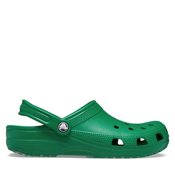 Klapki Crocs. Zielone klapki damskie Crocs, bez wzorów, bez obcasa, bez zapięcia. Za 239.99 zł.