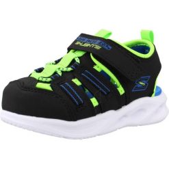 Sandały SKECHERS 407033N Czarny. Czarne sandały damskie Skechers, bez wzorów, z materiału, bez obcasa, bez zapięcia. Za 156.99 zł.