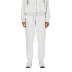Spodnie sportowe damskie New Balance WP41500AHH. Białe spodnie sportowe damskie New Balance, m, bez wzorów, z dresówki, na fitness i siłownię. Za 313.00 zł.