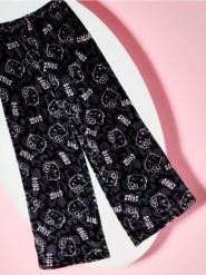 Spodnie polarowe od piżamy Hello Kitty - czarny. Czarne piżamy damskie Sinsay, bez wzorów, z polaru, bez ramiączek. Za 29.99 zł.