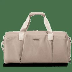 WINGS Torba sportowa SKYLARK beige. Brązowe torby sportowe Wings, bez wzorów, z materiału. Za 99.90 zł.