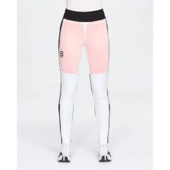 Spodnie narciarskie dla kobiet Daehlie Sportswear Thermo Pro. Białe spodnie sportowe damskie DAEHLIE, l, bez wzorów, z materiału, z podwyższonym stanem, narciarskie. Za 800.50 zł.