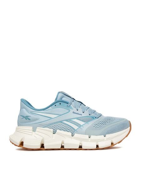 Reebok Buty do biegania EO-FLOATZIG 2 100244482 Niebieski. Niebieskie obuwie sportowe damskie Reebok, z materiału, bez zapięcia, do biegania. Za 272.99 zł.