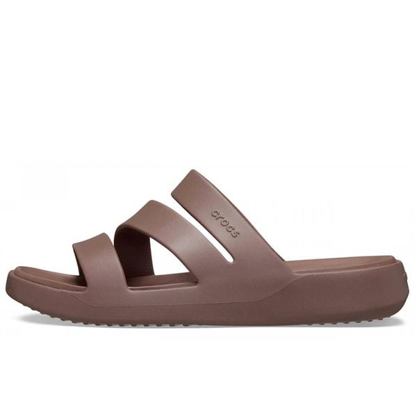 Crocs Sandały Getaway Strappy W Damskie. Brązowe sandały damskie Crocs, bez wzorów, z materiału, bez obcasa, bez zapięcia. Za 177.25 zł.