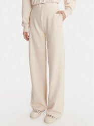 Guess Spodnie dresowe V6RB03 KD761 Kremowy Wide Leg. Białe spodnie dresowe damskie Guess, xl, z aplikacjami, z bawełny. Za 294.99 zł.