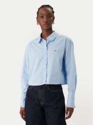 Tommy Jeans Koszula DW0DW22767 Błękitny Relaxed Fit. Niebieskie koszule damskie Tommy Jeans, s, bez wzorów, z bawełny, bez kołnierzyka, bez ramiączek. Za 409.99 zł.