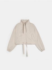 Kurtka bomber z lyocellu z domieszką lnu - kremowy. Białe kurtki damskie Sinsay, l, bez wzorów, z lyocellu, bez kaptura. Za 69.99 zł.