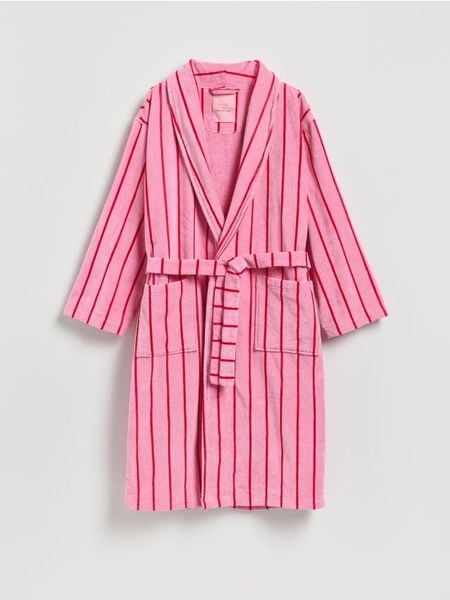 Szlafrok z paskiem - intensywny róż. Czerwone szlafroki damskie Reserved, bez wzorów, z bawełny, bez kaptura. Za 159.99 zł.