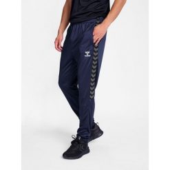 Spodnie dresowe treningowe Hummel Authentic. Niebieskie spodnie dresowe damskie Hummel, bez wzorów, z dresówki. Za 193.50 zł.