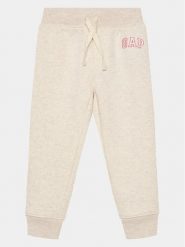 Gap Spodnie dresowe 688170-04 Szary Regular Fit. Szare spodnie dresowe dziewczęce GAP, bez wzorów, z bawełny. Za 89.99 zł.