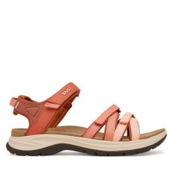 Sandały Teva. Pomarańczowe sandały damskie Teva, bez wzorów, bez obcasa, bez zapięcia. Za 409.99 zł.