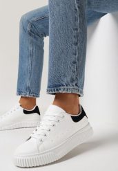 Biało-Czarne Sneakersy ze Żłobieniami na Płaskiej Podeszwie z Metaliczną Wstawką Granuse. Białe obuwie sportowe damskie Born2be, z jeansu, bez zapięcia. Za 79.99 zł.