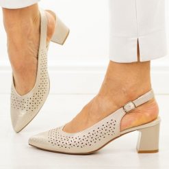 Złote ażurowe czółenka damskie bez pięty Sergio Leone Sk463. Żółte czółenka damskie Sergio Leone, w ażurowe wzory, ze skóry, bez obcasa, na obcasie. Za 179.00 zł.