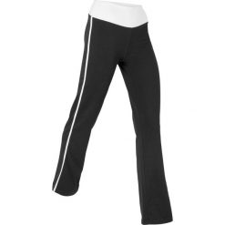 Spodnie sportowe z bawełny ze stretchem. Czarne spodnie dresowe damskie bonprix, bez wzorów, z bawełny, na fitness i siłownię. Za 79.99 zł.