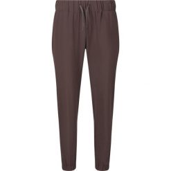 Damskie spodnie dresowe Athlecia Austberg. Brązowe spodnie dresowe damskie Endurance, bez wzorów, z dresówki. Za 193.50 zł.