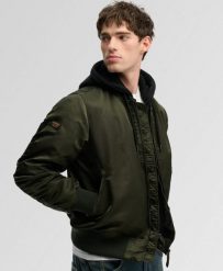 Superdry Kurtka Bomber MA1 z kapturem, lekko ocieplona – Surplus Goods Olive. Zielone kurtki damskie Superdry, l, z aplikacjami, z materiału, z kapturem. Za 384.00 zł.