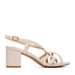 Sandały JENNY. Brązowe sandały damskie Jenny, bez wzorów, bez obcasa, na słupku, bez zapięcia. Za 119.99 zł.