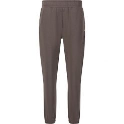 Damskie spodnie dresowe Athlecia Jillnana V2. Czarne obuwie sportowe damskie Athlecia, bez wzorów, z dresówki. Za 239.50 zł.