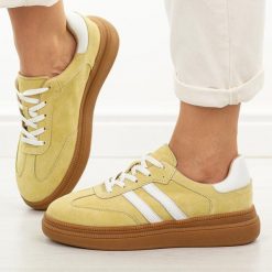 Żółte skórzane sneakersy damskie T.Sokolski 651. Żółte obuwie sportowe damskie Sokolski, na jesień, z jeansu, bez zapięcia. Za 219.00 zł.