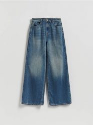 Jeansy wide leg z przetarciami - indigo jeans. Niebieskie jeansy damskie Reserved. Za 139.99 zł.