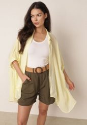 Żółta Zwiewna Koszula Letnia Oversize z Bawełny o Nietoperzowym Kroju Canomela. Żółte koszule damskie Born2be, na lato, l, bez wzorów, z bawełny, eleganckie, bez kołnierzyka, bez ramiączek. Za 139.99 zł.