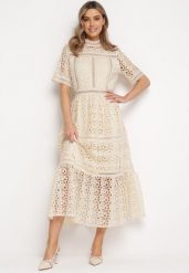 Beżowa Maxi Sukienka Rozkloszowana w Ażurowy Wzór z Falbanką Raviletta. Brązowe sukienki damskie Born2be, w ażurowe wzory, boho, bez ramiączek. Za 339.99 zł.