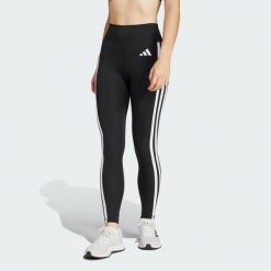 Legginsy Optime Essentials 3-Stripes 7/8. Białe legginsy damskie Adidas, z materiału, bez zapięcia, na fitness i siłownię. W wyprzedaży za 198.70 zł.