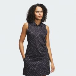 Koszulka Ultimate365 Printed Sleeveless Polo. Czarne bluzki damskie Adidas, bez wzorów, sportowe, bez kołnierzyka, bez ramiączek. Za 279.00 zł.