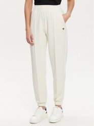 Guess Spodnie dresowe V5RB11 KCAY2 Écru Regular Fit. Spodnie dresowe damskie Guess, xl, z aplikacjami, z dresówki. Za 249.99 zł.