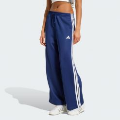 Spodnie dresowe Stadium 3-Stripes. Niebieskie spodnie sportowe damskie Adidas, s, bez wzorów, z bawełny. Za 279.00 zł.