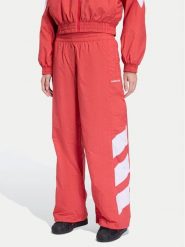Adidas Spodnie dresowe Blocked Washed KD8791 Czerwony Loose Fit. Czerwone spodnie dresowe damskie Adidas, l, bez wzorów, z dresówki. Za 204.99 zł.