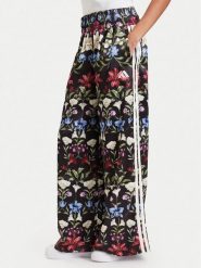 Adidas Spodnie dresowe Adidas X Farm Rio Premium KZ5536 Czarny Loose Fit. Czarne spodnie dresowe damskie Adidas, xs, bez wzorów, z dresówki. Za 599.99 zł.