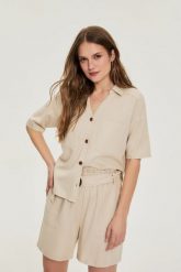 Koszula z krótkimi rękawami beżowa. Brązowe koszule damskie MOODO, l, bez wzorów, z bawełny, bez kołnierzyka, bez ramiączek. Za 119.99 zł.