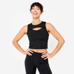 Koszulka fitness damska Domyos bez rękawów. Białe koszulki damskie DOMYOS, l, bez wzorów, z elastanu, bez kołnierzyka, bez ramiączek. Za 69.99 zł.