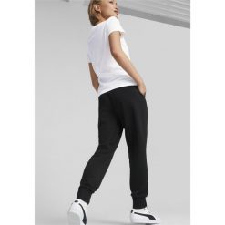 Damskie spodnie dresowe Essentials PUMA Black. Czarne spodnie dresowe damskie Puma, l, bez wzorów, z dresówki. Za 179.00 zł.