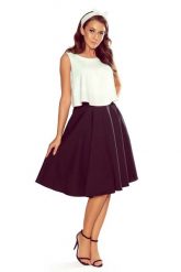 Czarna Casualowa Rozkloszowana Midi Spódnica z Kieszeniami. Czarne spódnice damskie NUMOCO, xl, bez wzorów, z elastanu, midi. Za 138.90 zł.
