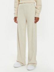 Guess Spodnie dresowe O4BB02 KCHZ2 Beżowy Relaxed Fit. Brązowe spodnie dresowe damskie Guess, m, z aplikacjami, z bawełny. Za 109.99 zł.