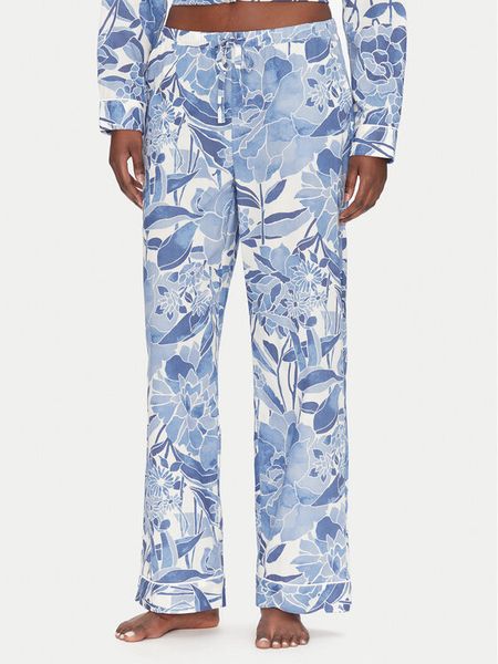 Gap Spodnie piżamowe 531506-15 Niebieski Relaxed Fit. Niebieskie piżamy damskie GAP, bez wzorów, z bawełny, bez ramiączek. Za 99.99 zł.