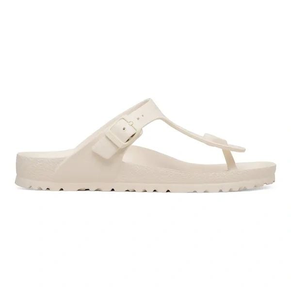 Birkenstock Gizeh EVA Eggshell Japonki damskie. Białe klapki damskie Birkenstock, bez wzorów, ze skóry, bez obcasa, bez zapięcia. Za 189.99 zł.