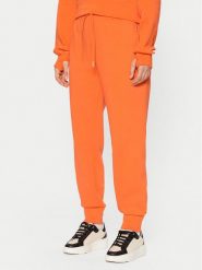 Lacoste Spodnie dresowe XF0343 Pomarańczowy Regular Fit. Brązowe spodnie dresowe damskie Lacoste, bez wzorów, z bawełny. Za 549.99 zł.