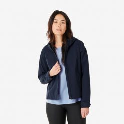 Kurtka turystyczna damska Quechua MH100. Niebieskie kurtki damskie QUECHUA, s, bez wzorów, z materiału, bez kaptura. Za 199.99 zł.