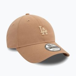 Czapka z daszkiem New Era Washed 940 La Dodgers. Brązowe czapki z daszkiem damskie New Era, bez wzorów. Za 119.99 zł.