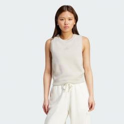 Koszulka bez rękawów Soft Lux. Czarne koszulki damskie Adidas, s, bez wzorów, bez kołnierzyka, bez ramiączek. Za 149.00 zł.