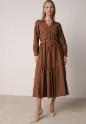 Brązowa Bawełniano-Wiskozowa Sukienka Koszulowa z Imitacją Kieszeni Biriala. Brązowe sukienki damskie Born2be, bez wzorów, z bawełny, eleganckie, bez ramiączek. Za 149.99 zł.