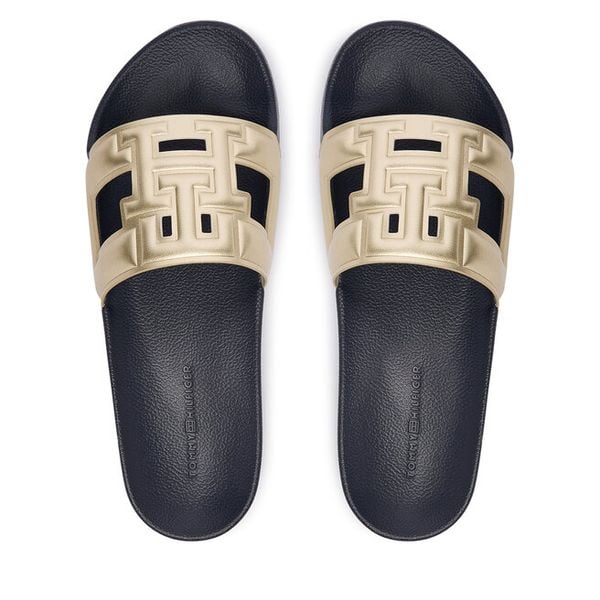 Klapki Tommy Hilfiger. Żółte klapki damskie Tommy Hilfiger, bez wzorów, bez obcasa, bez zapięcia. Za 189.99 zł.